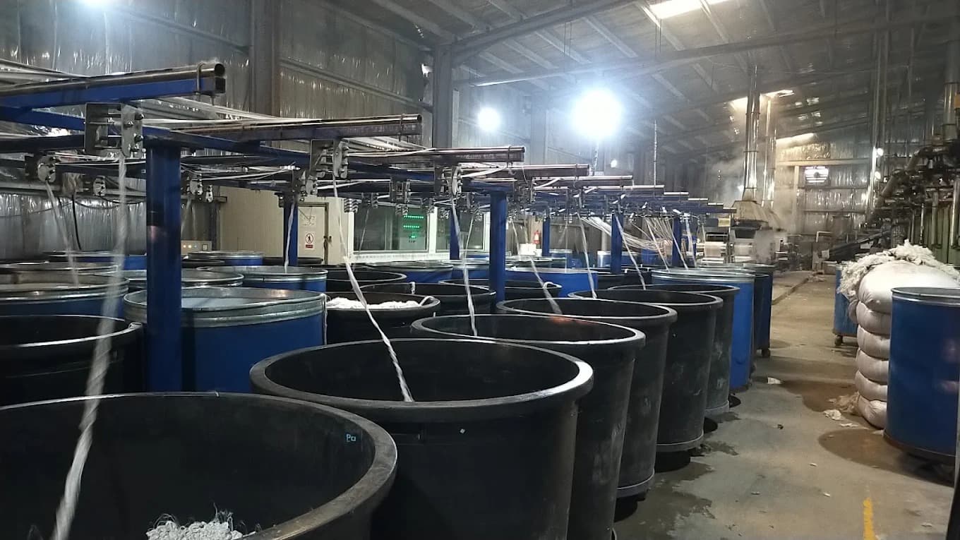 Fiber tow collection cans receiving continuous filament bands