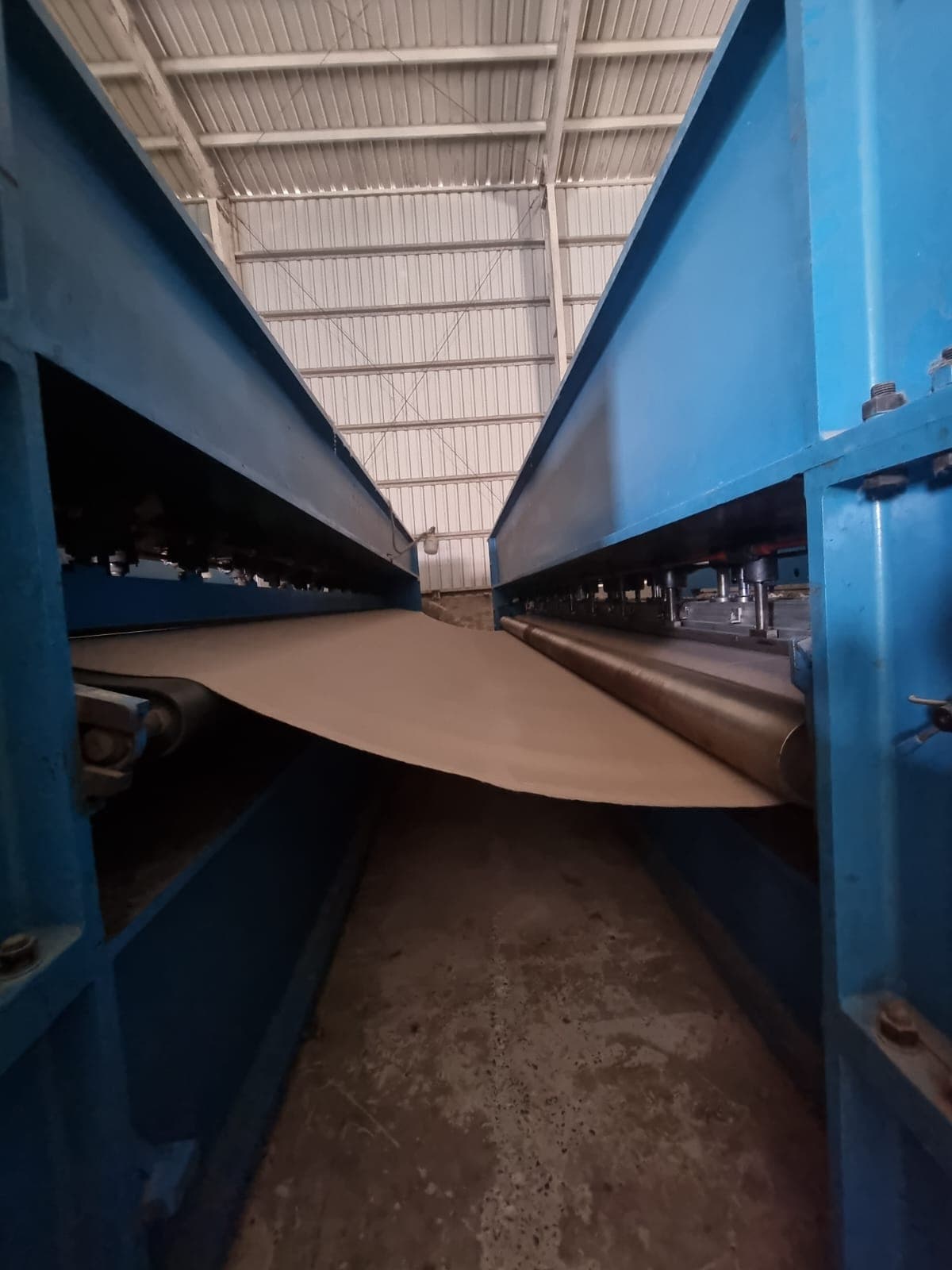 High-precision heated calendering rolls and web tension controller